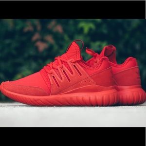 Red adidas tubular ( size 3.5 but fits like a 4)